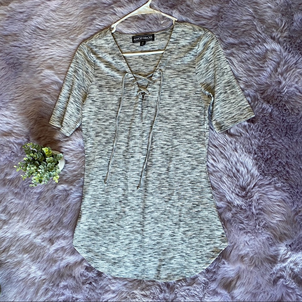 Almost famous women’s top size XL